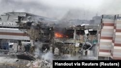 Toàn cảnh một trung tâm mua sắm bị hư hại nặng nề do một cuộc tấn công phi đạn của Nga, ở Dnipro, Ukraine ngày 29 tháng 12 năm 2023. Bộ phận báo chí của Cơ quan Khẩn cấp Nhà nước Ukraine ở vùng Dnipropetrovsk.
