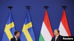 Thủ tướng Thuỵ Điển Ulf Kristersson, trái, và Thủ tướng Hungary Viktor Orban họp báo chung tại Budapest, Hungary, ngày 23/2/2024.